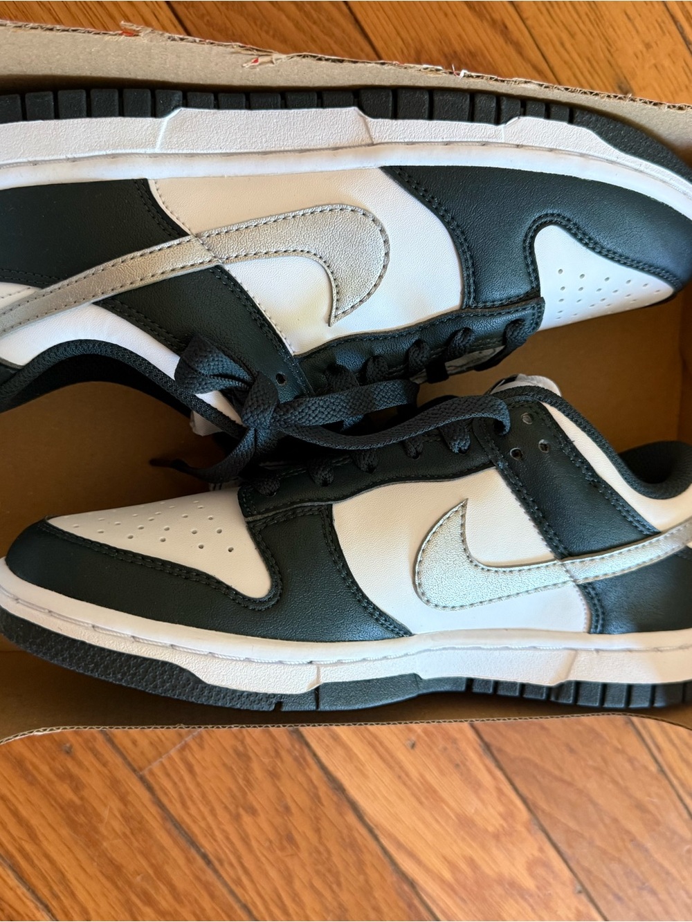 Nike Kids Low-Top Sneakers in Black, White, and Silver